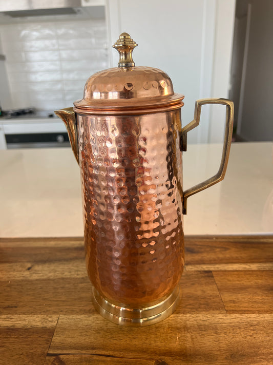 Handcrafted copper water jug